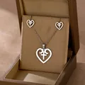 Silver stainless steel jewelry set with heart and cross pendants in a gold gift box - Heart Cross Style (TZ-445)