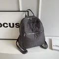 Minimalist grey quilted backpack for women with metal zippers and adjustable straps - Light Gray