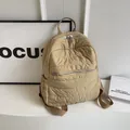 Quilted beige nylon backpack with horizontal stitching and brown fabric straps - Khaki