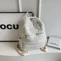 Quilted off-white backpack for women with large capacity and lightweight puffer design - White