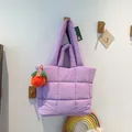 Purple quilted puffer tote bag with fluffy charm and comfortable double handles - Purple
