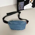 Blue denim waist bag with double zipper pockets and adjustable black nylon strap - Light Blue