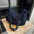 Dark blue denim hobo shoulder bag with a matching small round coin purse and wide strap - Dark Blue