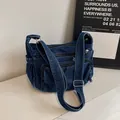 Sac de voyage polyvalent en denim bleu foncé avec multiples poches et bandoulière - Taille unique / Bleu foncé