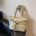 Quilted light green tote bag with floral embroidery and matching coin purse - Green
