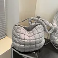 Gray quilted puffer cloud bag with spacious square stitching and wide shoulder strap - Gray