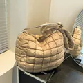 Light brown quilted cloud bag with puffy nylon texture and wide shoulder strap - Khaki