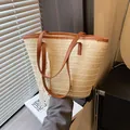 Handwoven straw tote bag in cream white with brown leather straps and lace ribbon detail - Beige