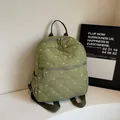 Grass green quilted backpack for women featuring white bow embroidery and rhombic patterns - Green
