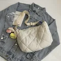Quilted crossbody bag in beige with adjustable wide strap and plush heart charms - With Pendant / White