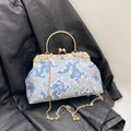 Vintage Chinese qipao evening bag with blue dragon embroidery and gold chain strap - Silver