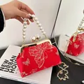 Bolso retro rojo con bordado de mariposa, asa de perlas y cadena dorada - Rojo