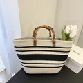 French straw woven tote bag in cream and black with natural bamboo handles - Striped Beige White