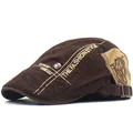 Detalle de gorra vintage de algodón con bordado de moda y emblema de calavera de metal - Ajustable / café