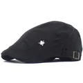 Detail of black cotton flat cap featuring metal eagle badge and embroidered GIOR logo - Adjustable / Black