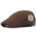 Detail view of cotton flat cap featuring fashion letter embroidery and metal button - Adjustable / Coffee