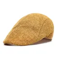 Close-up of mustard yellow mesh beret featuring vintage breathable woven linen texture - One Size / Gold