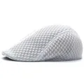 Close-up of the breathable mesh texture on the side of this light grey flat ivy cap - Kids 54cm / White