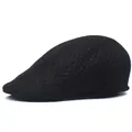Close-up of black breathable mesh flat cap showing the honeycomb hollow fabric texture - Kids 54cm / Black