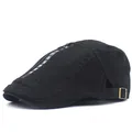 Béret noir en coton avec fermeture éclair à anneau et texte Follow Me stylé - Noir