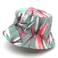 Detail of floral bucket hat showing tropical leaf print and breathable embroidered eyelets - M / Green