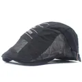 Detail view of the breathable black mesh panel and adjustable metal buckle on the hat - Adjustable / Black