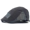 Detail of gray mesh panel and side buckle on black summer beret with embossed logo - Adjustable / Gray