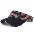 Detail of sports sun visor with geometric orange and grey camouflage pattern on white background - Adjustable / Orange