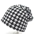 Classic black and white houndstooth knit slouchy beanie for women on a white background - M (56-58cm) / Off White