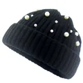 Detail of black ribbed knit beanie with elegant white faux pearls on white background - Half Pearl Black