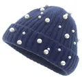 Detail showing navy blue ribbed knit texture and white pearl accents on the beanie - Full Pearl Navy Blue