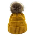 Detail of yellow knit beanie with soft pom-pom and thick ribbed texture design - M / Yellow