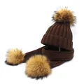 Winter set with knitted beanie hat and scarf featuring three fluffy fur pom-poms in dark brown - Coffee