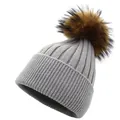 Close-up of light grey striped knit beanie with fluffy brown pom-pom and rolled cuff - M (56-58cm) / Light Gray