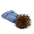 Detail of light blue wool knit beanie with thick texture and fluffy brown pom pom - M (56-58cm) / Light Blue