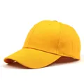 Detail of a bright yellow cotton baseball cap with six-panel design and reinforced stitching - Adjustable / Yellow