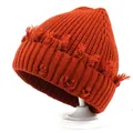 Distressed knit beanie hat in burnt orange with fringe detail and ribbed cuff for winter - M (56-58cm) / Rust red