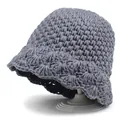 Close-up of grey knit bucket hat showing thick crochet texture and wavy brim design - M (56-58cm) / Gray