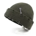 Detail of dark green distressed knit beanie with silver rings and a safety pin accent - M (56-58cm) / Green