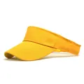 Detailed close-up of yellow sun visor showing cotton texture and reinforced stitching - Yellow