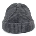 Detailed view of the dark grey ribbed knit texture on this warm winter beanie hat - M / Gray