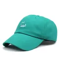 Dettaglio del berretto da baseball verde acqua con ricamo smile e trama in cotone diagonale - M (56-58cm) / Verde