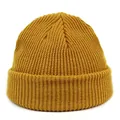 Close-up of mustard yellow ribbed knit beanie with fold-over cuff texture detail - M / Ginger Yellow
