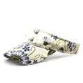 Detail of floral satin sun visor showing elegant cream fabric and stitching quality - M (56-58cm) / Beige