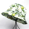 Detail of printed bucket hat with green leaves and yellow pear patterns on white fabric - M (56-58cm) / Natural Green Leaf Pear Style / Green
