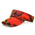 Detail of tropical palm leaf print on a breathable sun visor with reinforced stitching - M (56-58cm) / Orange
