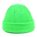 Detail of the chunky knit texture and folded cuff on a neon green docker hat - M / Fluorescent Green