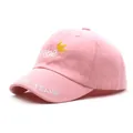 Close-up of pink baby baseball cap with crown and 'bebe' letter embroidery detail - Pink