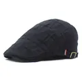 Detail of black cotton flat cap with distressed texture, metal buckle and red label - Black