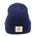 Detailed close-up of dark blue ribbed beanie featuring an outdoor wildlife adventure patch - M (56-58cm) / Navy Blue